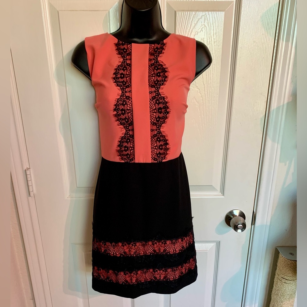 Pink dress with black lace detail